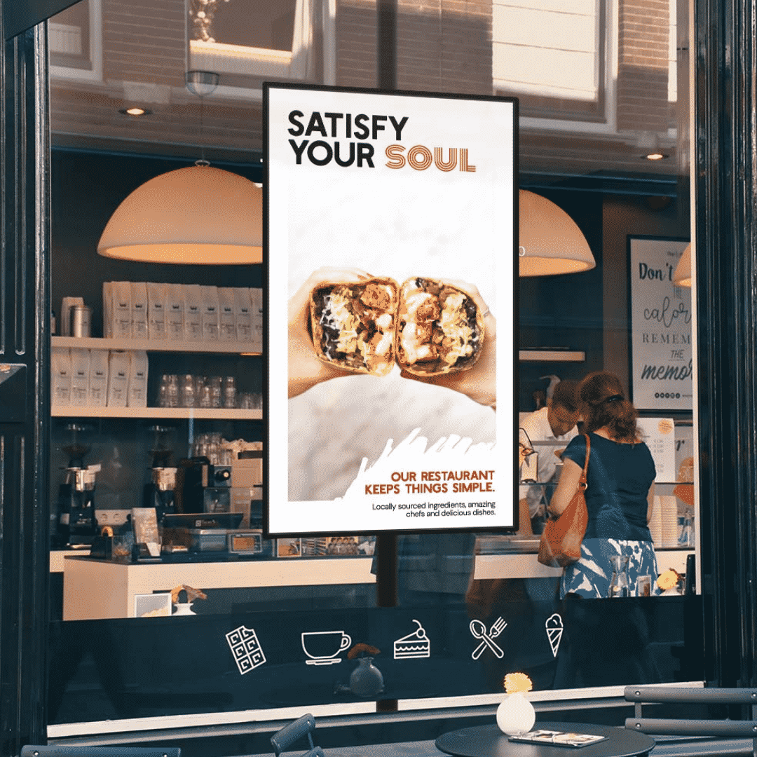 A portrait digital promotion screen displayed in a restaurant window